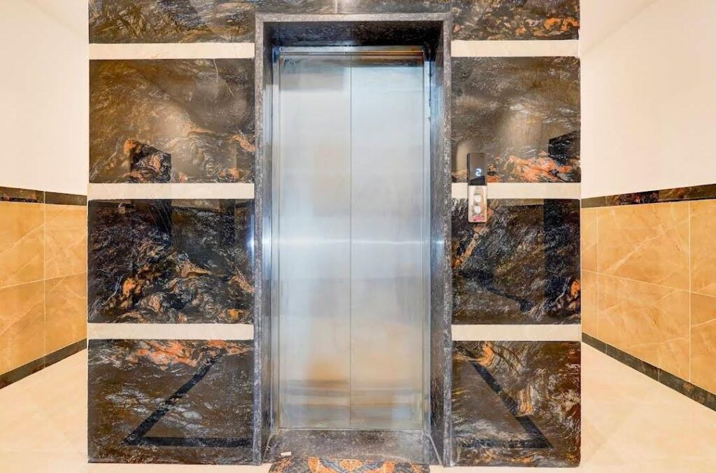 Elevator facility inside JG Residency hotel in Brookefield