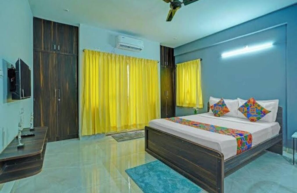 Spacious family hotel room with clean interiors at JG Residency AECS Layout