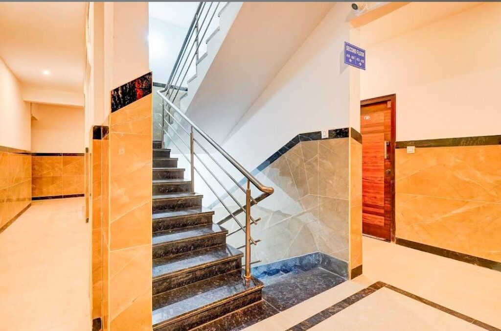 Clean and safe staircase inside JG Residency Brookefield hotel